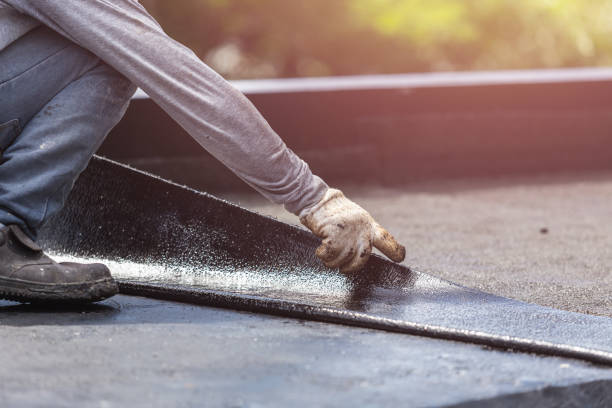 Professional Exterior Waterproofing technician working in New Liberty, KY